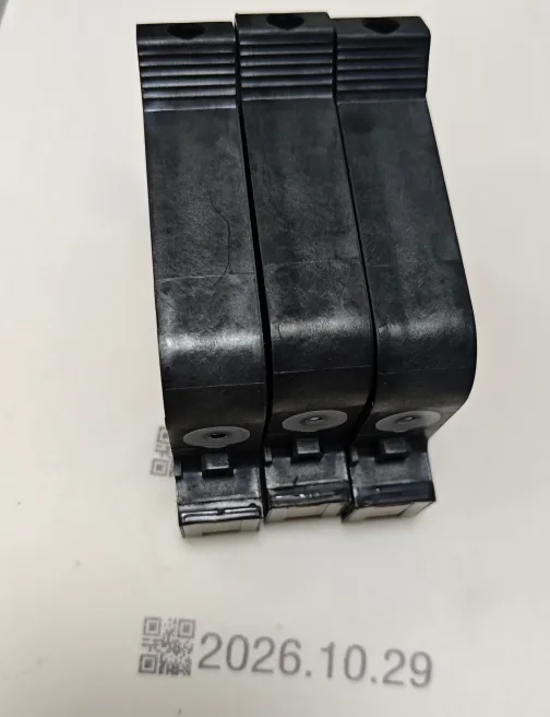 Three black solvent TIJ cartridges standing on end on carton board, with a QR code and the date 2026.10.29 printed on the board in front of them